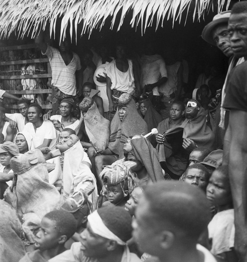 An Igbo masquerade from Abiriba, called Ngbagba Ikoro, featuring the chorus and band from the 1930s. Photo by G. I. Jones.