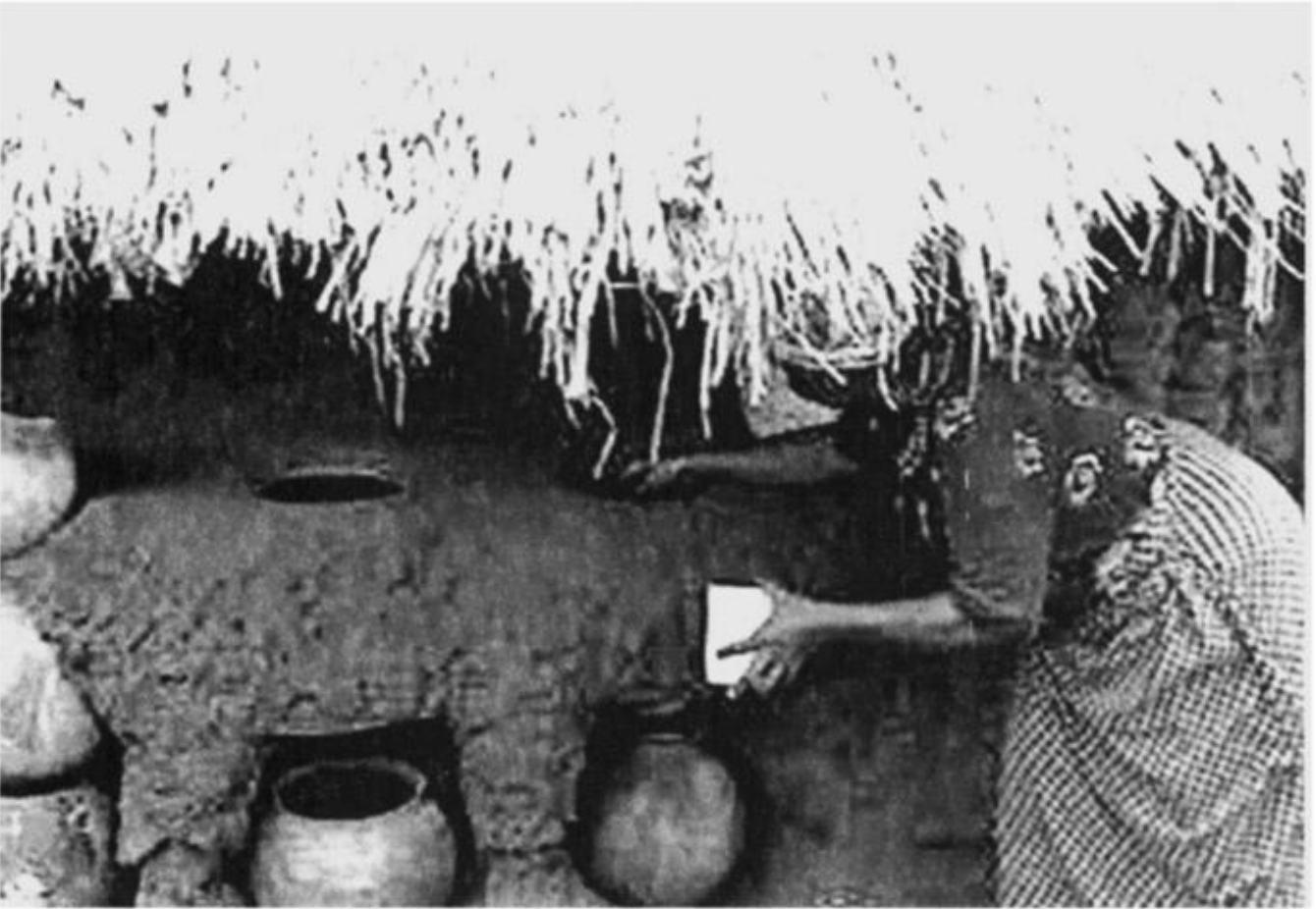 An Okposi Salt Producer Monitoring the Filtration of Salt Brine at a Salt Hut. Source: Gloria Chuku