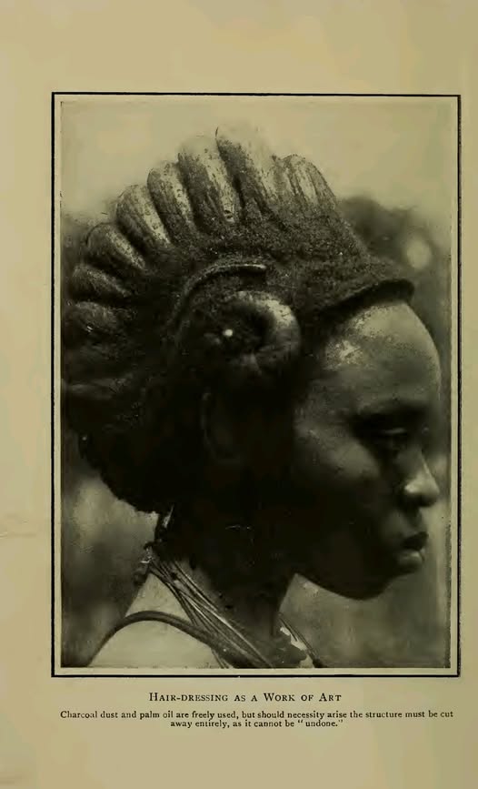 Photo of a beautiful Igbo maiden rocking the 'Nkpu Ceremonial Hairstyle'.