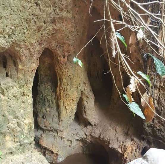 The sacred cave of Ibini Ukpabi, meaning "Drum of the Creator God" in Ibibio, nestled in Arochukwu’s dense rainforest,