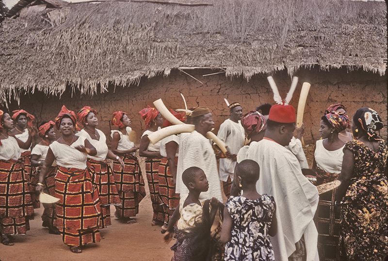 An "Age-Grade" group performs the Oziziani dance in a vibrant parade before the Iba. Photo - A Mighty Tree