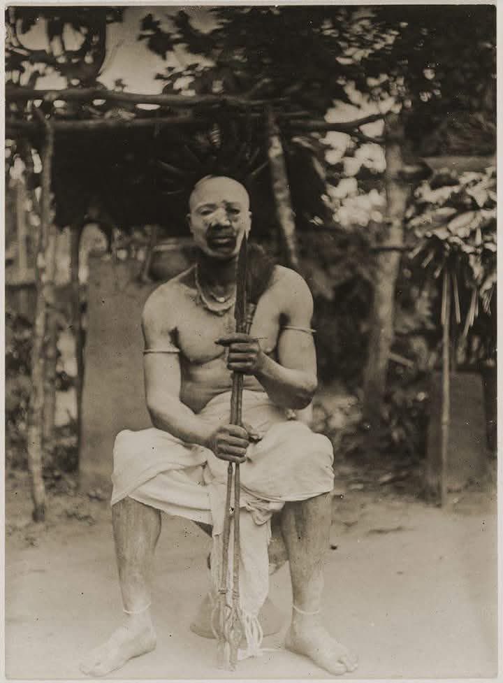 A 1912 photograph by Northcote Thomas showing Chief Mgbeze of Okpanam shortly after his title-taking ceremony.
