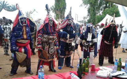 Masquerades performing during the Arobinagu Agwunsi Festival at Nri