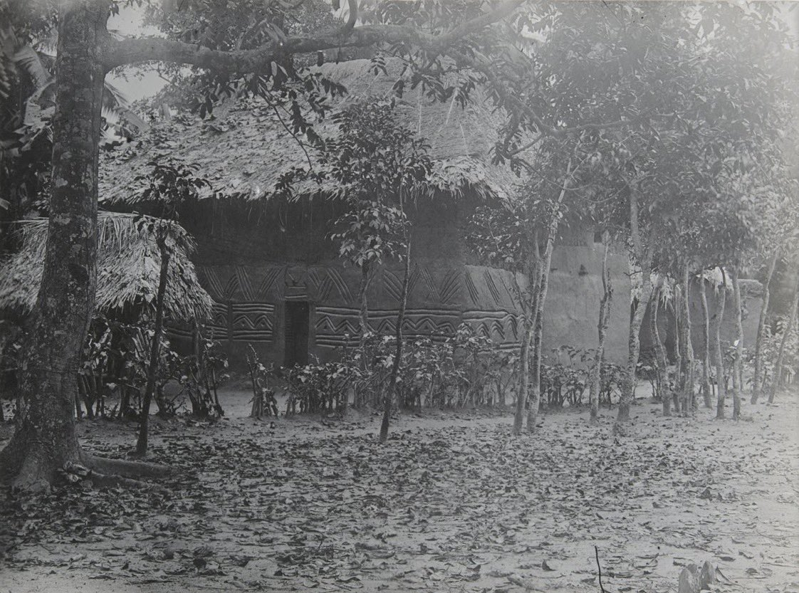 Archival image showing Igbo houses, towers, and compound layout