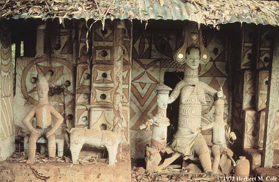 Photo of an Igbo ancestral shrine showing ritual figures and offerings.