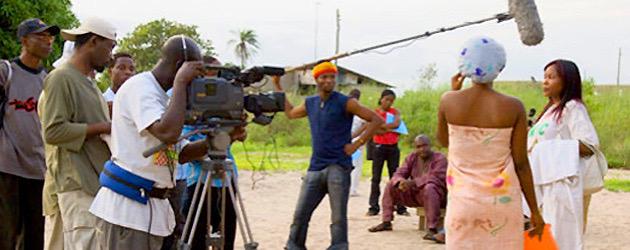 Nigerian film crew shooting a movie scene.