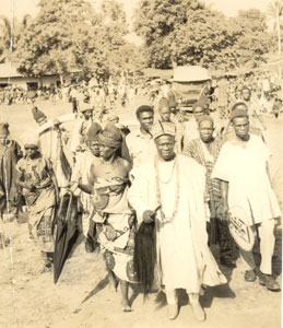 The procession of Eze Nri with Okike trumpeter in the background (courtesy Onwuejeogwu M.A during Iguaro festival)