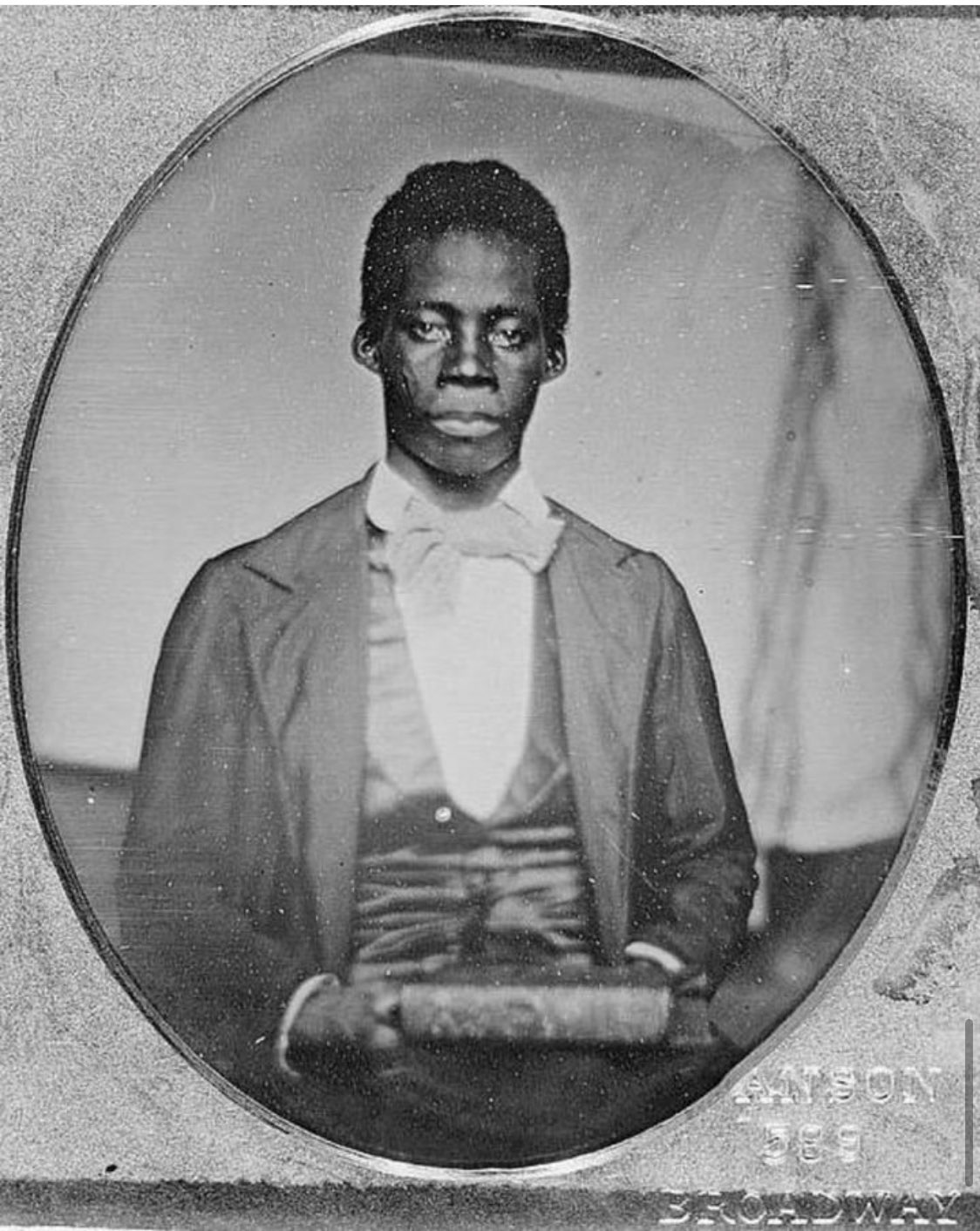 [Edward Wilmot Blyden, half-length portrait, facing front, holding book]