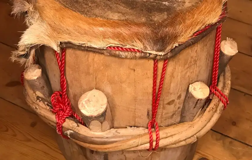 Talking drum symbolizing Igbo oral tradition