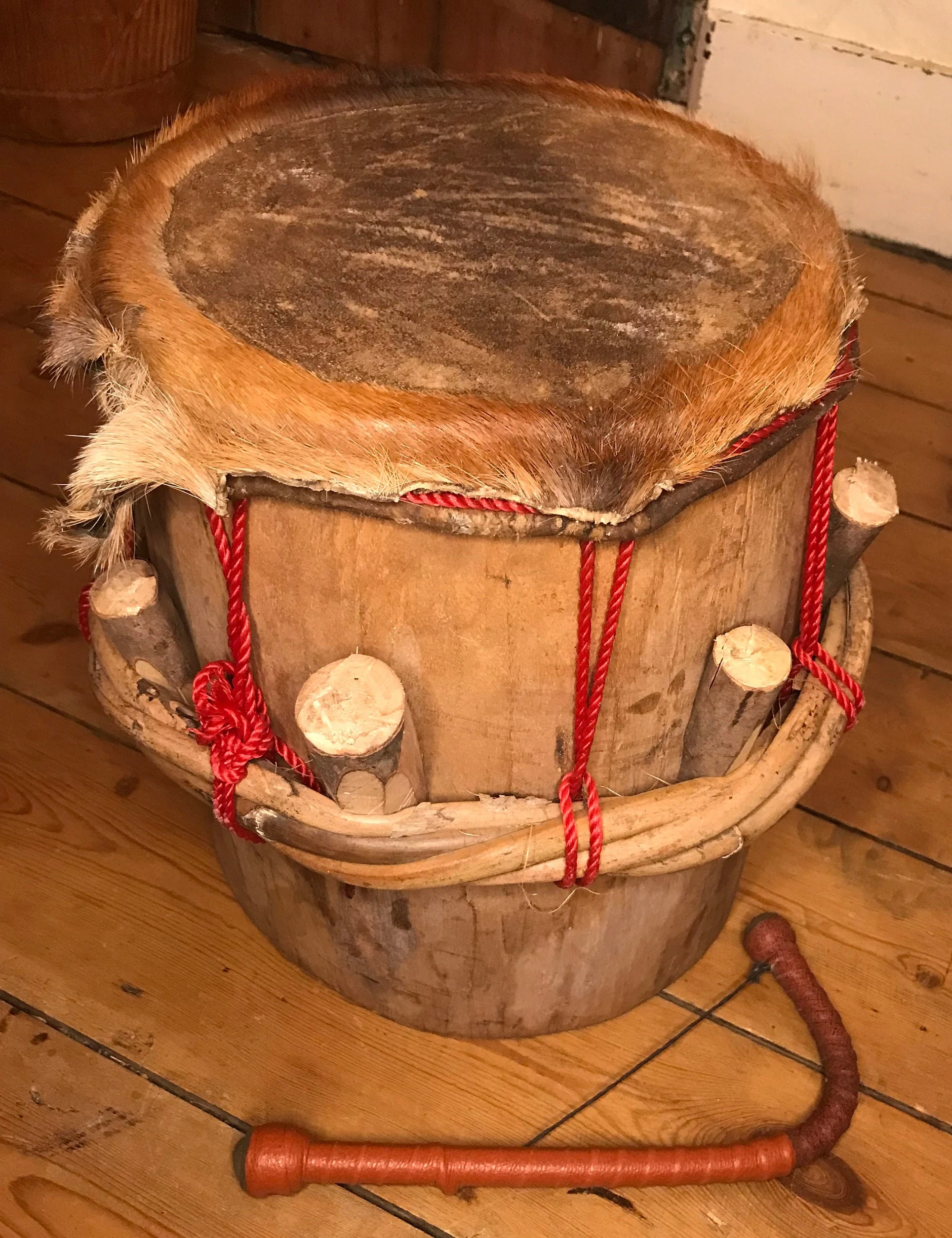 Talking drum symbolizing Igbo oral tradition